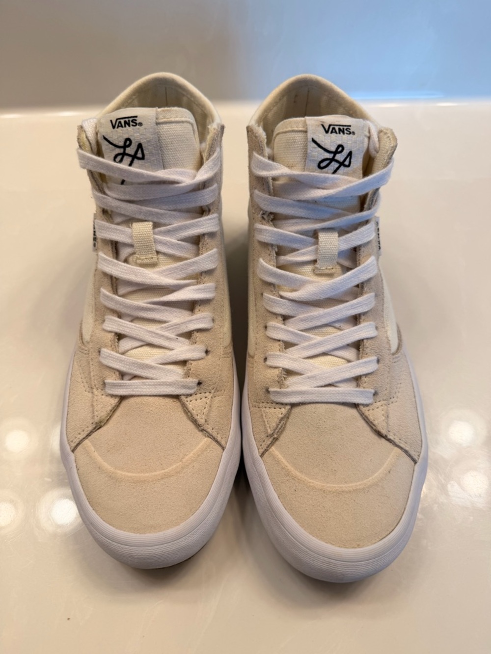 Vans High-Top Sneakers in Cream and White